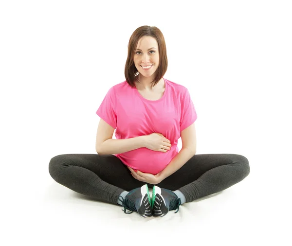 Pregnant woman doing exercising — Stock Photo, Image