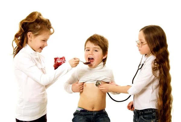 Happy children playing hospital — Stock Photo, Image