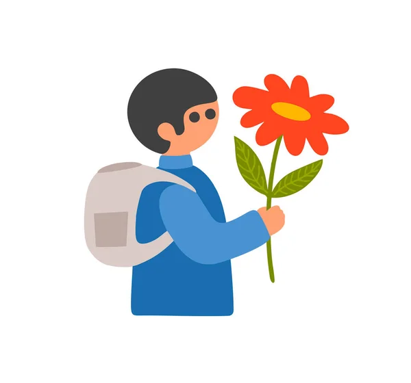 Pupillpojken med en stor blomma som går i skolan. Presentera till teatchern. — Stock vektor
