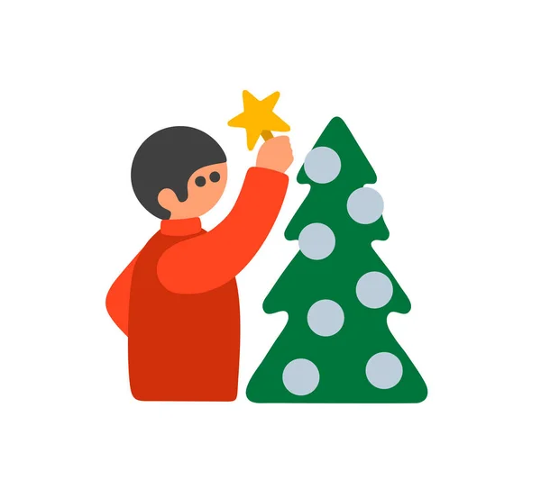 Niño decorando árbol de Navidad con estrella dorada para la parte superior. — Vector de stock