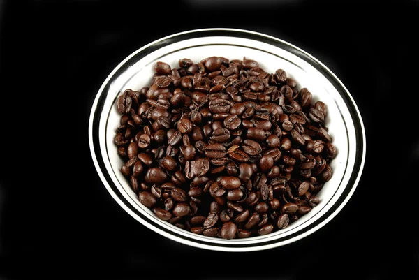 盘子里的咖啡豆 免版税图库图片