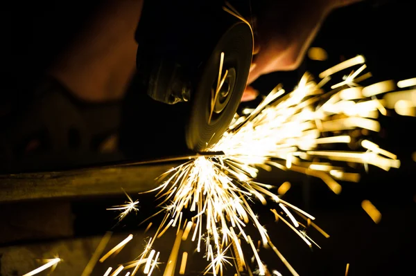 Metal grinding on steel pipe — Stock Photo, Image
