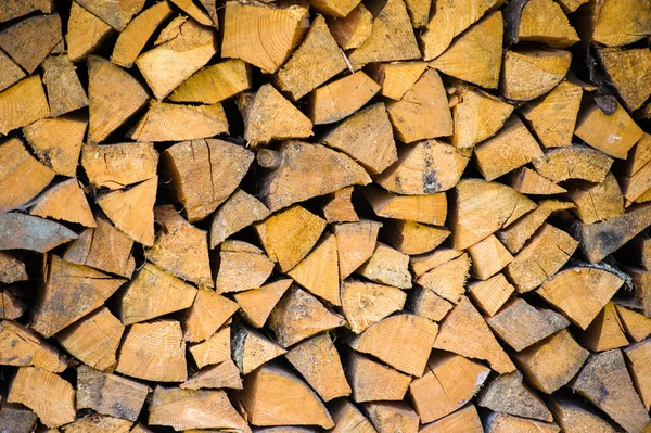 Pęczki tło drewna opałowego — Zdjęcie stockowe
