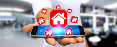 Bir daire kiralamak için modern cep telefonu kullanarak iş adamı