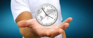 İş adamı elinde bir saat tutuyor.