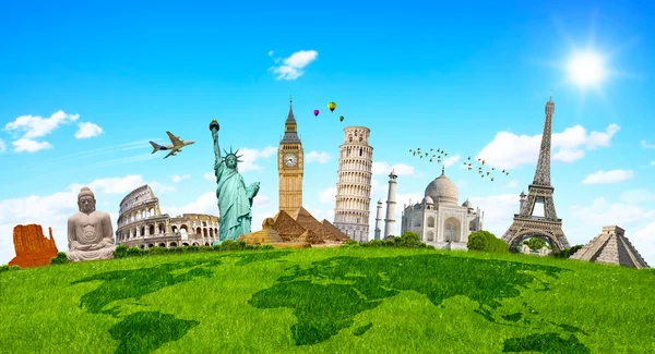 Famous monuments of the world surrounding green grass — Stock Photo, Image
