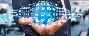 Dijital dünya ile web simgeleri kullanarak iş adamı