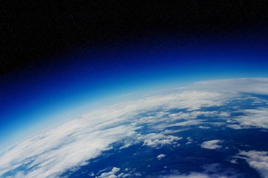 Uzayda Dünya gezegeni üzerinde gündoğumu