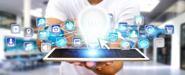 Ampul dijital simgelerle tutan işadamı