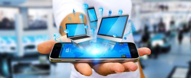 Teknik cihaz elinde tutan işadamı