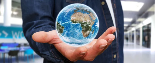 Man holding the planet earth in his hand — Stock Photo, Image