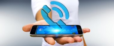 Dijital telefon kullanarak iş adamı