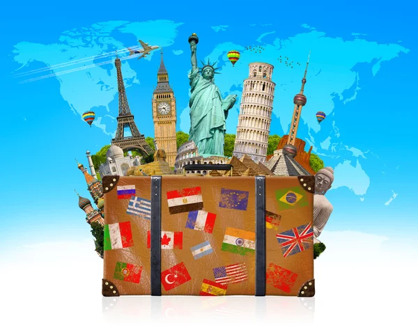 Travel bag full of famous monument of the world — Stock Photo, Image