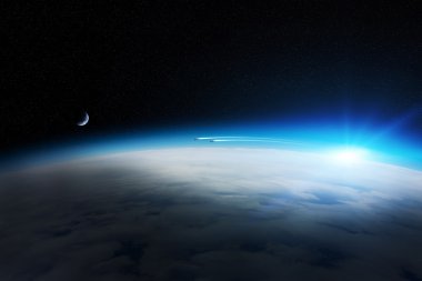 Uzayda Dünya gezegeni üzerinde gündoğumu