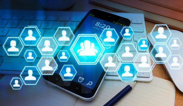 Red social azul avatar y teléfono móvil —  Fotos de Stock