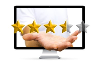 Genç işadamı eliyle dijital yıldız kullanarak sıralama