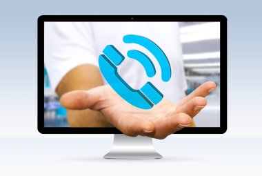 Mavi telefon simgesini elinde tutan işadamı