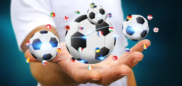 Affärsman håller fotboll i handen — Stockfoto