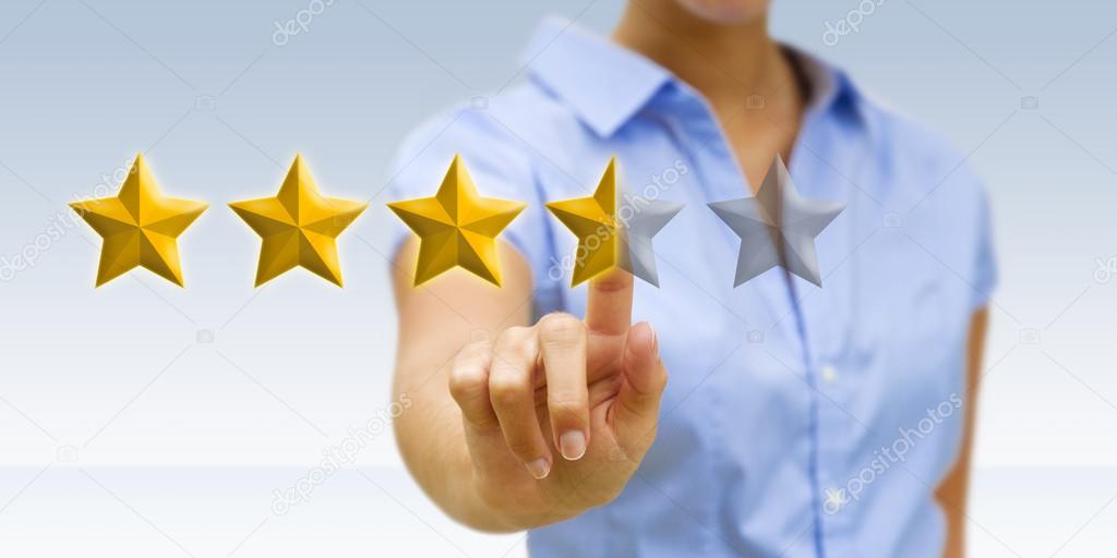 Young woman rating stars