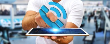 Dijital telefon kullanarak iş adamı