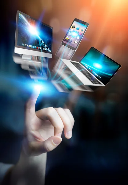 Tech devices and icons connected to businesswoman hand — Stock Photo, Image