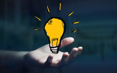 Elle çizilmiş ampul holding iş kadını