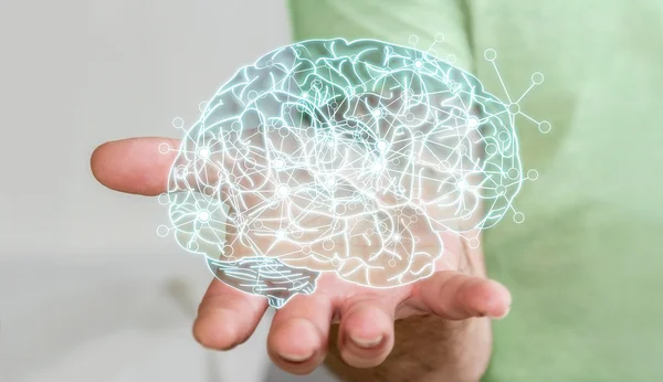 Man håller röntgen mänskliga hjärnan i sin hand — Stockfoto