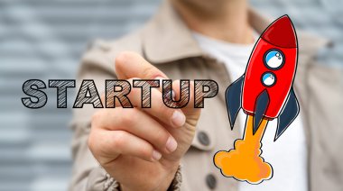 Başlangıç metin ve kırmızı roket kalemle çizim işadamı