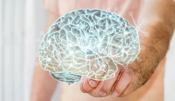 Mann berührt menschliches Gehirn mit dem Finger — Stockfoto