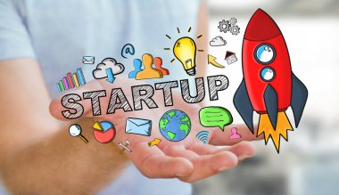 Elle çizilmiş başlangıç metin ve kırmızı roket tutan işadamı