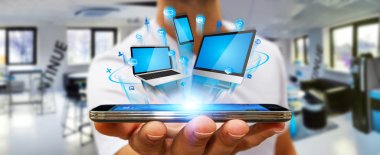 Teknik cihaz elinde tutan işadamı