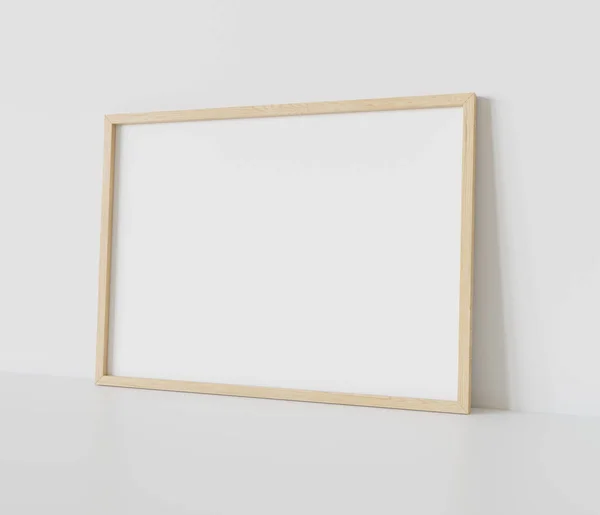 内部モックアップの白い床にもたれて木製の長方形のフレーム 壁に額装された画像のテンプレート3Dレンダリング — ストック写真