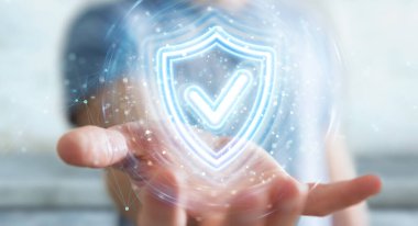 Bulanık arkaplandaki adam dijital kalkan koruması mavi holografik arayüzü kullanarak 3D görüntüleme