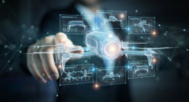 Karanlık arka plandaki iş adamı parmaklarındaki holografik insansız hava aracı projeksiyonuna dokunuyor.