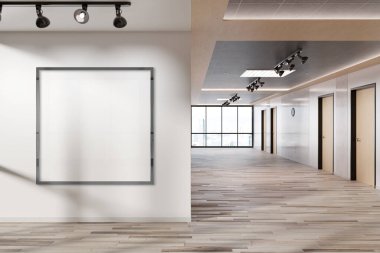 Metalik kare çerçeve ofis duvarında asılı. Modern ahşap ofis içerisindeki 3 boyutlu bir reklam panosunun maketi.