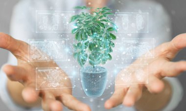 Arka planda bulanık duran ve dijital analizi 3D olan bir bitkinin holografik yansımasına dokunan kadın.