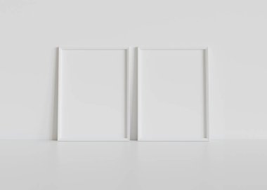İki beyaz dikdörtgen çerçeve iç modelin beyaz zeminine dayanıyor. 3B bir duvardaki resimlerin şablonu