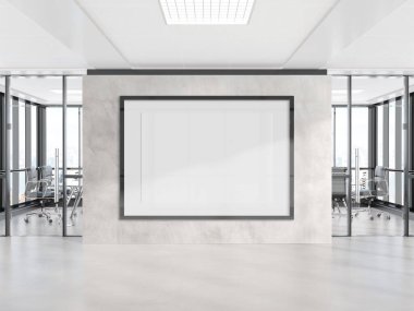 Ofis duvarında asılı siyah yatay çerçeve. Modern beton şirketinin 3D döşeme içindeki bir reklam panosunun maketi.