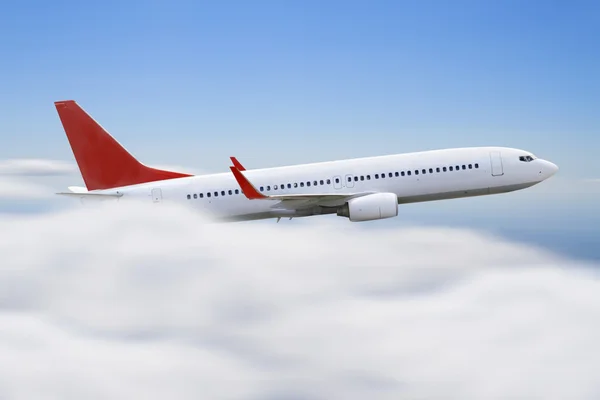 Avión volando sobre las nubes — Foto de Stock