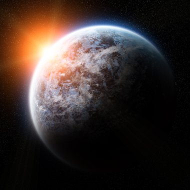 Uzayda Dünya gezegeni üzerinde gündoğumu