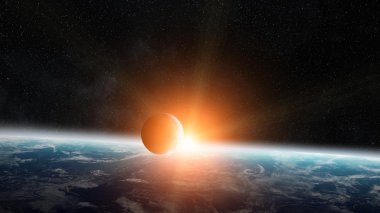 Uzayda Dünya gezegeni üzerinde gündoğumu
