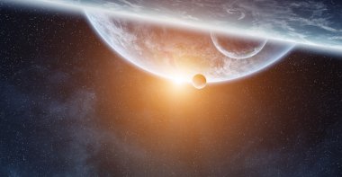 Uzayda Dünya gezegeni üzerinde gündoğumu