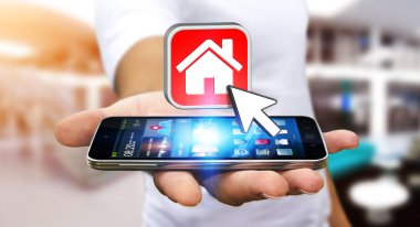 Bir daire kiralamak için modern cep telefonu kullanarak iş adamı