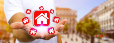 Bir daire kiralamak için modern cep telefonu kullanarak iş adamı