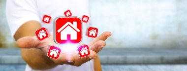 Bir daire kiralamak için modern cep telefonu kullanarak iş adamı