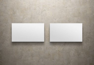 Beton arka planda izole edilmiş iki Minimalist kartvizit. 3B görüntüleme
