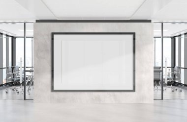 Ofis duvarında asılı siyah yatay çerçeve. Modern beton şirketinin 3D döşeme içindeki bir reklam panosunun maketi.