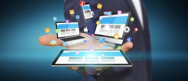 Teknik cihaz elinde tutan işadamı