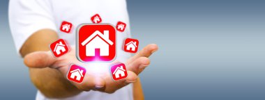 Bir daire kiralamak için modern cep telefonu kullanarak iş adamı