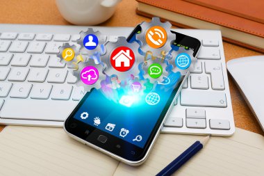 Modern cep telefonu ile cogwheels kutsal kişilerin resmi